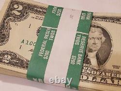 One Pack 100 Circulated Two Dollar Bills. ($200) in Federal Reserve Strap. Money