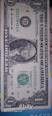 One dollar bill fancy serial number 0 thru 7