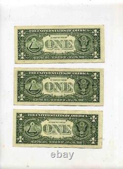 3 billets avec des duplicatas de dollars de la série B de 2013