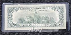 Billet de cent dollars de la Réserve fédérale, série 1969 C, numéro de série 05724236.