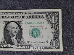 Billet de un dollar avec numéro de série élaboré en trinaire et marque-pages !
