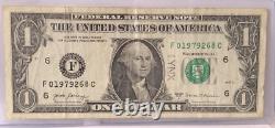 Erreur de contamination de l'encrier avec un numéro de série élégant sur un billet d'un dollar F01979268C FW
