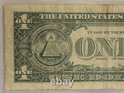 Erreur de contamination de l'encrier sur un billet d'un dollar F01979268C FW avec un numéro de série noir