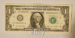 Série d'erreurs sur un billet d'un dollar de 2021 - Note mal coupée, faute d'impression et décentrée