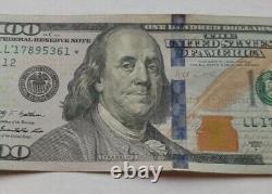 Un billet de 100 dollars de la série 2009A avec étoile / Numéro de série fantaisie rare
