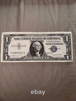 Un rare billet de 1 dollar argenté de la série A de 1957 avec un sceau note bleue