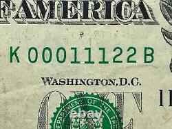 Véritable numéro de série fantaisie ternaire du billet d'un dollar K00011122B Super échelle