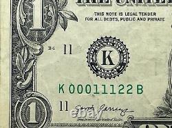Véritable numéro de série fantaisie ternaire du billet d'un dollar K00011122B Super échelle